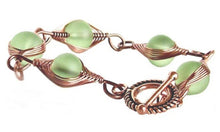 Load image into Gallery viewer, Artisan bracelet antiqued copper cultured SEA GLASS wire-wrapped . 10mm round beads &amp; toggle clasp - green