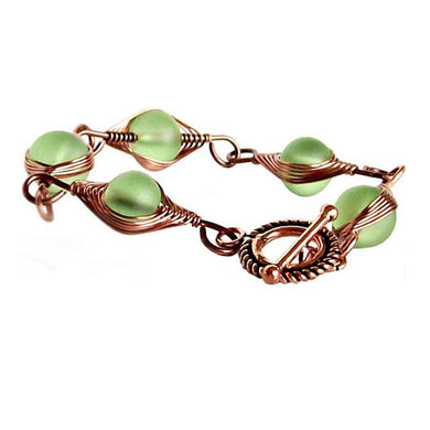 Artisan bracelet antiqued copper cultured SEA GLASS wire-wrapped . 10mm round beads & toggle clasp - green