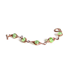 Load image into Gallery viewer, Artisan bracelet antiqued copper cultured SEA GLASS wire-wrapped . 10mm round beads &amp; toggle clasp - green
